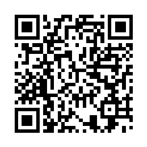 她穿一身打着补丁但洗得干干净净的布衣二维码生成