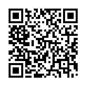 孙璇向单位的老同志介绍了利特以后二维码生成