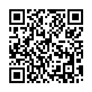 孟方看着一辆越野车朝着目的地开去二维码生成