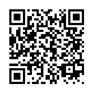 孤零零地看着电视里苍白的政治新闻二维码生成