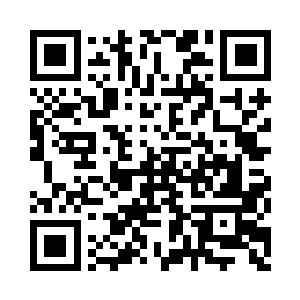 宾利以一副胜利者的姿态坐在主席台上二维码生成