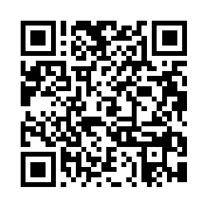 将清理好的肥鱼用石块架在火堆上烧烤二维码生成