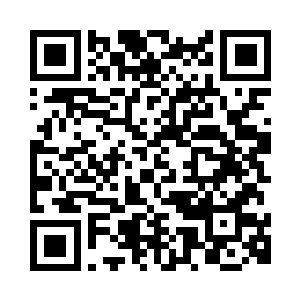 就听到杨洛在哼哼唧唧的唱着什么二维码生成