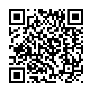 就好像站在狂放潮水里的一块礁石二维码生成