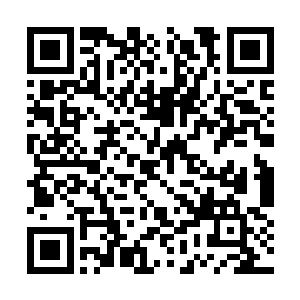 就是韩韵向韩秋月和周狼提到过的那个银行的行长二维码生成