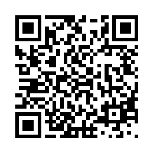 尸体横七竖八地躺在被炸毁的碎石和废墟上二维码生成