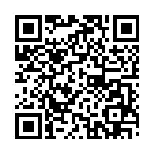 山顶中央镌刻出了一块沟壑深深的圆盘法纹二维码生成