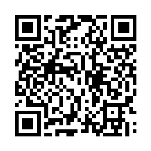 巴克就抱住手臂靠在墙边默默的看着二维码生成