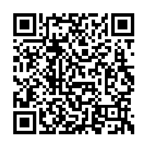 巴克把那部油罐车的步话机挂在肩头的背包带上二维码生成