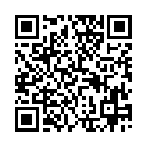 建筑表面的防御符文不断闪烁着荧光二维码生成