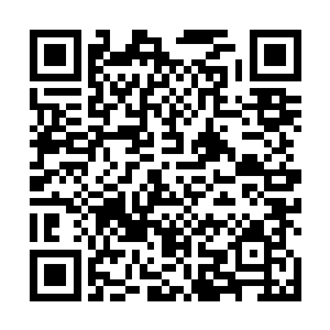 当驾驶员被高扬和乌里杨科扶着从直升机里跳出来之后二维码生成