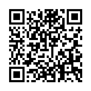 徐少成正带着那十个村民在门口等着二维码生成