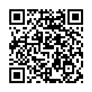 总理事务衙门帮办大臣裕山手中拿着电报二维码生成