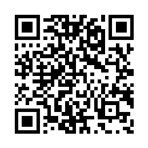 惊恐不已地看着面前的这个看起来很友善二维码生成