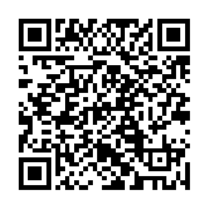 我就又把自己从达摩堂里面拿到的那一个佛帖拿了出来二维码生成