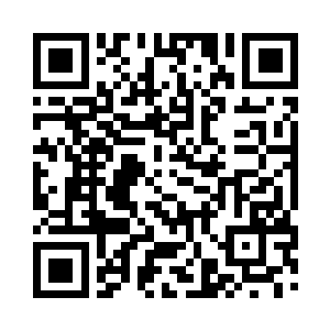 手术中一名白衣大褂的医生对着他的下手说道二维码生成