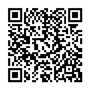 执法队某小队之领队突然挥枪指向一名怒眼相视敢怒不敢言之人二维码生成