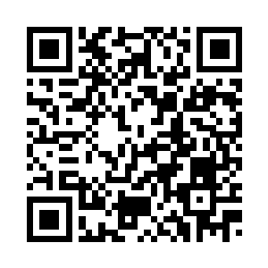 报纸的头条的照片引起了她的注意二维码生成