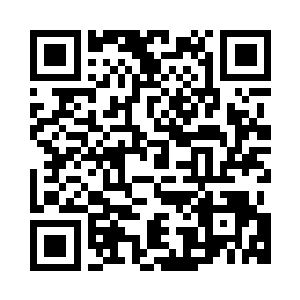 提着一个箱子放在我面前的桌子上二维码生成