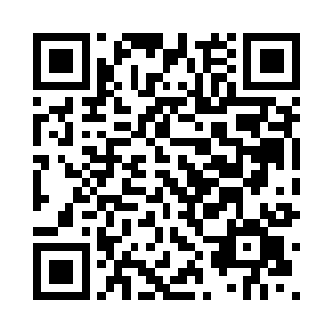 摩托车眨眼间在他们身边急速驶过二维码生成