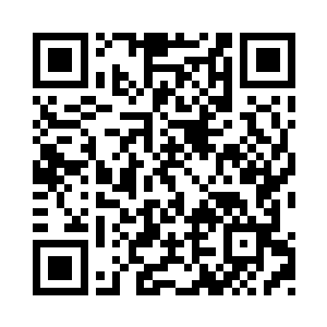 整个拥堵在马路上游行示威的人数肯定过万了二维码生成