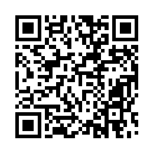 方腾伏案正在处理着一大堆文书公文二维码生成