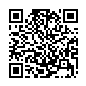 无数静默矗立的傀儡们站在甬道两侧二维码生成