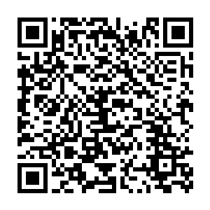 本來在江岸边高高低低杂乱无序的乱石堆变成了摆放有序的巨石阵二维码生成