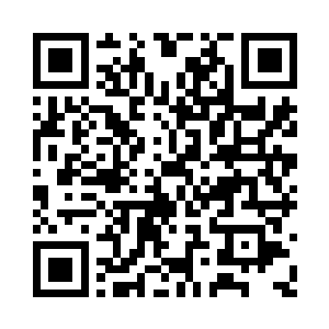 朱平安在中午的时候穿过了一个低矮的山区二维码生成