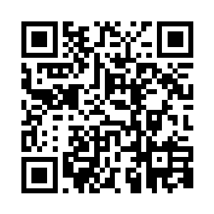 李金方就在摄像机后面的位置上坐着二维码生成