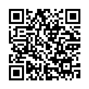 杨锐俯身从自己桌下面拿出易拉罐二维码生成