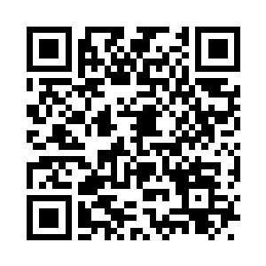 杨霄百无聊奈地躺在殿前台阶上晒着太阳二维码生成