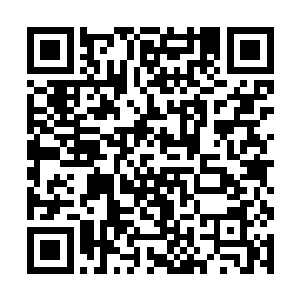 检查了一下里面已经变成亮银的液状物后又重新封起二维码生成