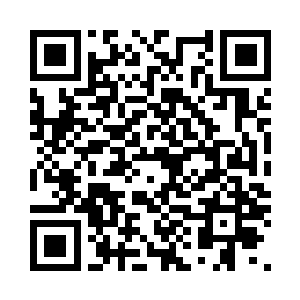 欢喜哥很愉快的接受了记者们的采访二维码生成