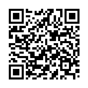 欧阳志远微笑着给每一位老人号脉二维码生成