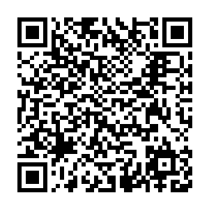正在闭着眼睛盘膝坐在坑道尽头的一个稍大一些的山洞之中闭着修炼着二维码生成