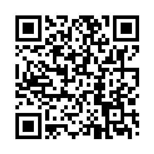 正盯着桌子正中央的知己知彼显示镜二维码生成