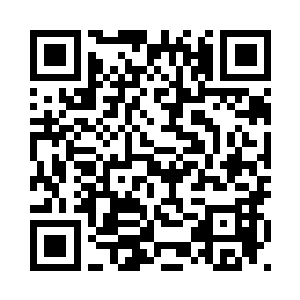 泊着数艘印有淮河航务标识的舰船二维码生成