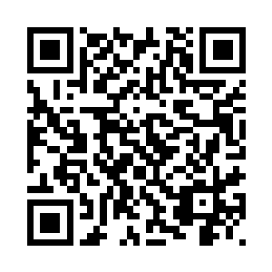 满脸欣喜的将圣光本源珠拿在手中二维码生成