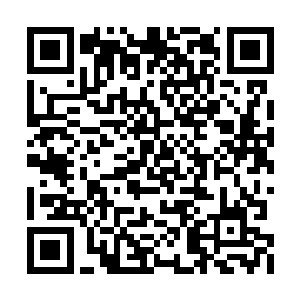 然后咬着面包靠在水槽台边心满意足地嚼了起来二维码生成