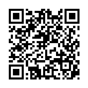 然后驾轻就熟的踩着砖头爬上了墙头二维码生成