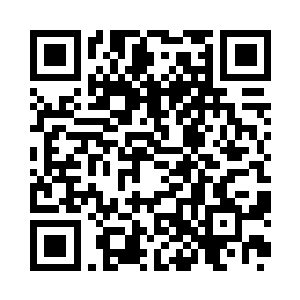 特意从家里给朱平安带来他珍藏的一本二维码生成