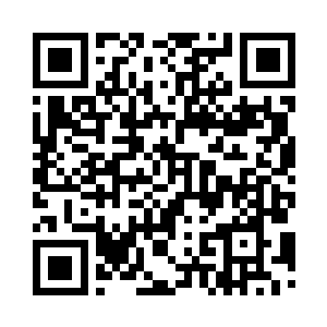 王小峰指着市政府外面的那排门脸房二维码生成