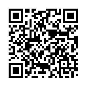 用大拇指用力按了按自己的太阳穴二维码生成