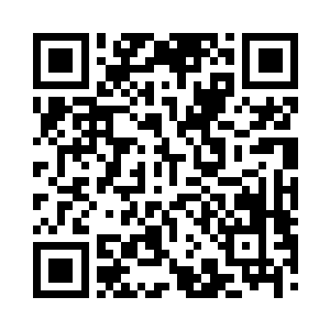 用手摸了摸石头上面棺材钉留下来的痕迹二维码生成