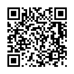 由几十名壮汉挥汗如雨地旋转着摇杆二维码生成