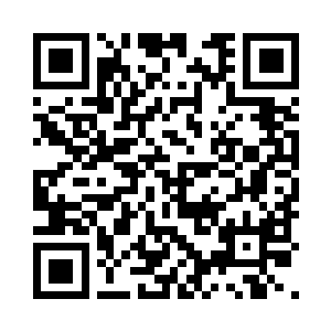 由匠人精心设计了防止颠簸的精巧架子固定二维码生成