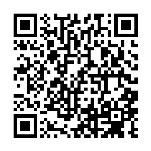 略带沙哑味道的女声就像是黄昏时分恋恋不舍的阳光二维码生成