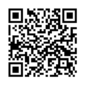 看上去就好似一个迷你骷髅的男子二维码生成