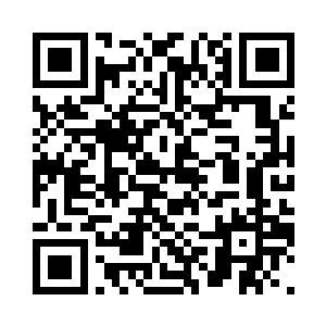 看到大黄狗的嘴里似乎叼着什么东西二维码生成